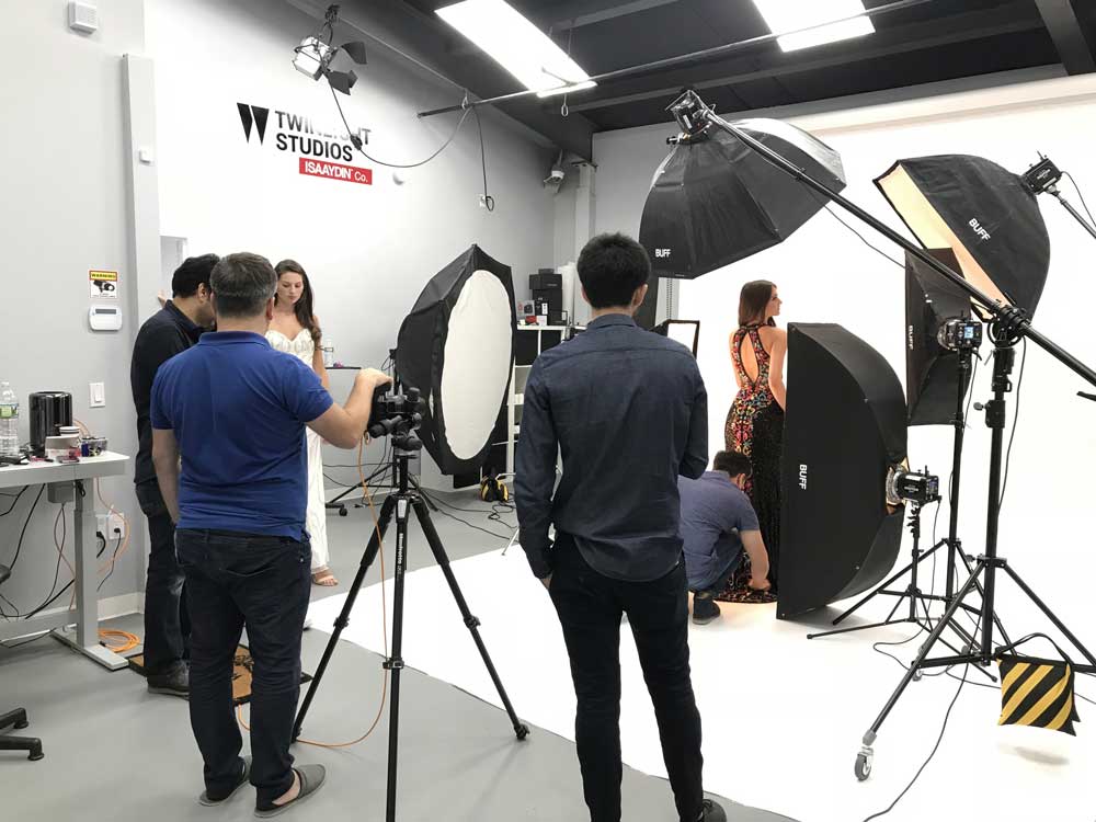 Behind the scenes with models during dresses photoshoot